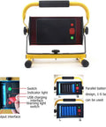 Spot Lighting Led Floodlight Rechargeable 70W Portable Work Light with USB output and control panel, yellow handle and base.