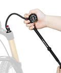 Hand using the Beefy High Pressure Bike Shock Pump With Gauge For Mountain Bike And Road Bikes, 300 Psi To 400 Psi, No Air Loss, Schrader Valve