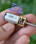 Heavy Duty Mini DC Gear Motor With Full Metal Gearbox 3V-6V 50RPM Slow Spin Gear Reduction 1:240 D Shaft close-up in hand