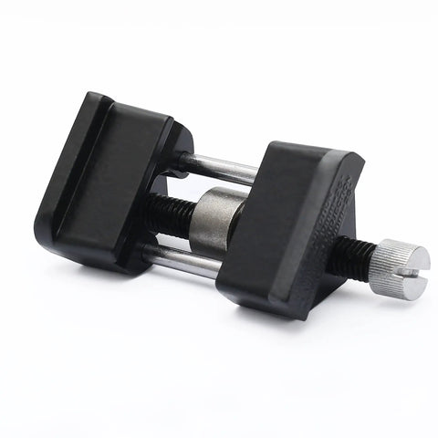 Side view of black honing guide for chisels and planes with precise angle control and sharp edge every time, metal and plastic components.