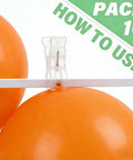 Premium Ten Pack Of Heavy Duty Spring Clips Measuring 3.5 Inches Featuring Transparent Plastic Build holding orange balloons on a white strip.