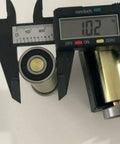 Badass 2x72 Belt Grinder Small Wheel Kit For Knife Makers And Bladesmiths measuring steel cylinder with caliper.