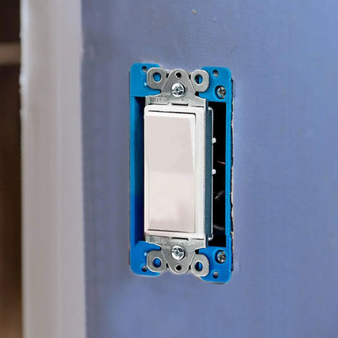 Installed Six Pack Half Inch Single Gang Receptacle Box Extender with Twelve Screws, Blue, on Wall