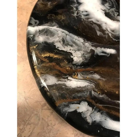 Close-up of 9.5 Inch Resin Marble Lazy Susan With Smooth 360 Degree Rotation For Kitchen Countertop And Dining Table Slick Black Gold White Organizer For Skincare Bath And Home Decor showing black, gold, and white swirls.