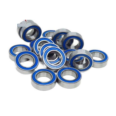 Blue Ball Bearings Set 10 Pack 4x10x4 MR104 2RS High Precision RC Car And Truck Bearings in a scattered view