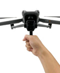 Hand holding Drone Handheld Stabilizer And Lens Bracket Mount For Air 3S Dope One Shot Cinematic Takeoff And Landing.