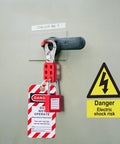 No Fuss Lockout Tagout Station And Group Safety Kit Featuring Osha Compliant Pads Hasps Tags And Hooks Job Site Ready Hanging Board with safety lock.