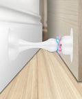 Side view of Heavy Duty Stainless Steel Door Stopper With Magnetic Catch in white, keeping door open against a wall.
