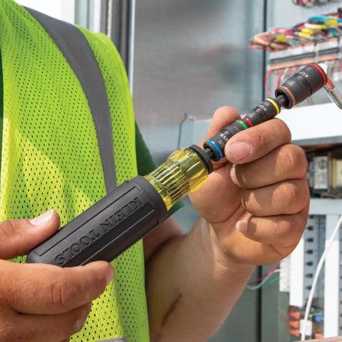 Worker using Impact Driver Kit With 7 In 1 SAE Socket Set And 14 In 1 Multi Bit Adjustable Length Screwdriver Two Piece For Tough Jobs.
