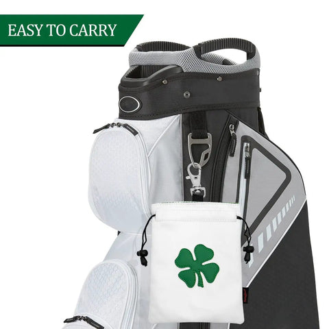 Leather Golf Valuables Pouch With Drawstrings attached to a stylish golf bag, featuring a four-leaf clover design on white PU leather.
