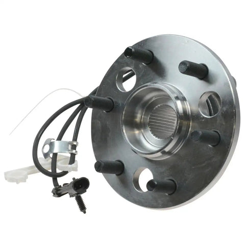 Premium 17 Piece Steering And Suspension Overhaul Kit Dropping In Easy On Your 4WD Chevy Tahoe featuring a wheel hub with integrated sensors.