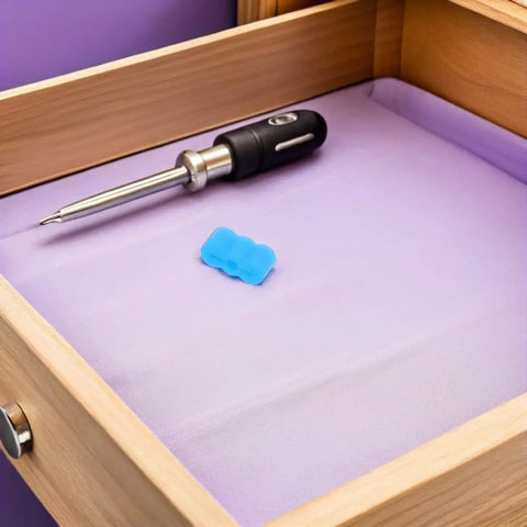 Blue rubber drawer track stop next to a screwdriver in a wooden drawer, 20 Pcs Rubber Drawer Track Stops With Silent Glide For Easy DIY Installation