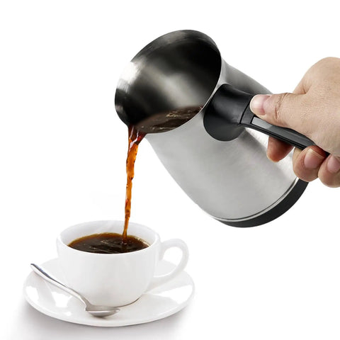 Pouring coffee from Electric Turkish Coffee Pot 600ml With Foldable Handle Stainless Steel Heating Tea Kettle 110V US Plug For Home And Travel