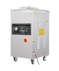 Straight Up One Thousand Watt Vacuum Sealer For Kitchen Storage And Light Commercial Use, Solid As A Rock Chamber that showcases a stainless steel body and control panel.