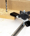 Heavy Duty Aluminum Hold Down With Soft Pvc Tips For 3/8X16 Threads Includes Quick Release Star Knob keeping wood secure during drilling.