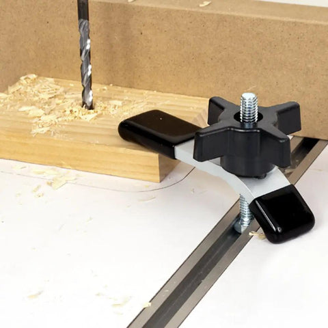 Heavy Duty Aluminum Hold Down With Soft Pvc Tips For 3/8X16 Threads Includes Quick Release Star Knob keeping wood secure during drilling.