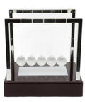 Classic Desk Pendulum Toy With Stable Base Cradle Science Gadget for Energy Transfer on a brown plastic base.