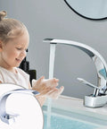 Child washing hands under Chrome Bathroom Sink Faucet With Single Handle And Single Hole Install Dope Brass Lavatory Vanity Basin Mixer Tap Includes Supply Hose And Pop Up Drain Assembly 7.8 Inch Spout Modern Spa Style