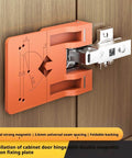 Cabinet Door Hinge Spacer Kit With Magnetic Drill Guide For 35mm Hinges ABS Hinge Jig shown installed on wooden cabinet