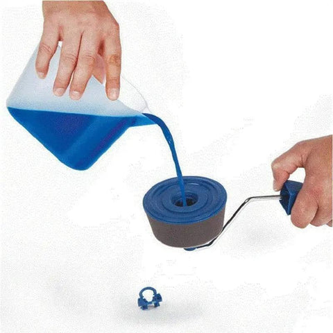 Pro Quality Paint Roller Brush Set With Slick Leakproof Grip And Deep Paint Reservoir For Clean Wall Trimming and Hassle Free Diy Room Refreshes That Roll Out Smooth pouring blue paint into roller.
