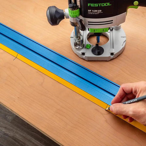 Low Profile Straight Edge Guide Rail Kit Extension Setup For Circular Saw Router And Jigsaw That Snaps Right On And Keeps Your Cuts Dead On Across Plywood And Solid Stock Wood with a router on wood surface.