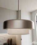 Station 2-Light Brushed Nickel Drum Pendant Light With Dimmable Feature in modern kitchen setting, frosted glass shade.