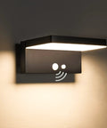 Solar Motion Sensor Outdoor Wall Light With 600 Lumen Output And 3 Modes, IP44 Aluminum Waterproof Sconce in use.