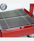 Close-up of Dual Head Espresso Machine For Home And Cafe With Barista Grade Insulated Boiler drip tray and thermometer.