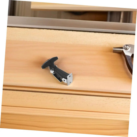 Close-up view of a black rubber T-handle latch from the Three Pack Rubber T Handle Latch Kit For Vehicle Hood Tool Box Camper Trailer.