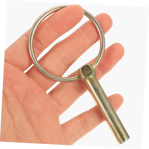 Close-up of clevis pin with hitch ring clip held in hand from 12 Piece Heavy Duty Clevis Pin And Safety Pin Kit With Hitch Ring Clips