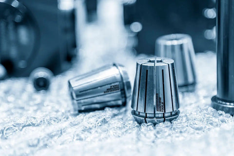 Ultra Precision Spring Collets For CNC Milling And Lathe, 0.0001in TIR, close-up view on reflective surface
