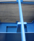 Heavy Duty Metalworking Downdraft Table Featuring Dual Motors And Killer 3700 Cfm Airflow filter section inside a blue metal casing.