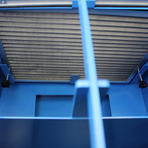 Heavy Duty Metalworking Downdraft Table Featuring Dual Motors And Killer 3700 Cfm Airflow filter section inside a blue metal casing.