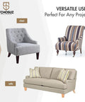 Grey and striped chairs with a beige sofa showcasing walnut wood furniture legs with casters.