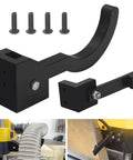 Collapsible Dust Hose Guide And Outfeed Hook For DW735 Planers, black metal with bolts, designed to tidy vacuum lines on workbench.