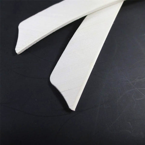 Close-up of Archery Feather Fletching Set, 4 Inch Real Turkey Vanes for Hunting and Target Shooting, white color detail.