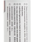 Side view of Beefed Up Hammer Bit Grease Vessel with visible instructions on white spill-proof container model 194683-7