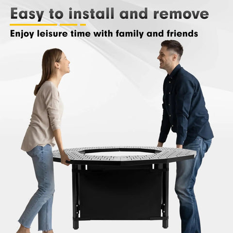 Couple carrying 48 Inch Fire Pit Surround Tabletop For Solo Stove Bonfire And Wood Burning Pits, 28.4 Inch Inner Diameter, Coated Metal Outdoor Fire Pit Table With 360 Degree Safety Barrier For Easy Backyard Hangouts