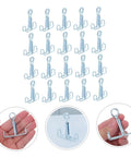 Laboratory Adjustable Rubber Hose Clamps 25 Pack Flow Control Tube Clips Spring Stop Clips for experiments, shown in hand