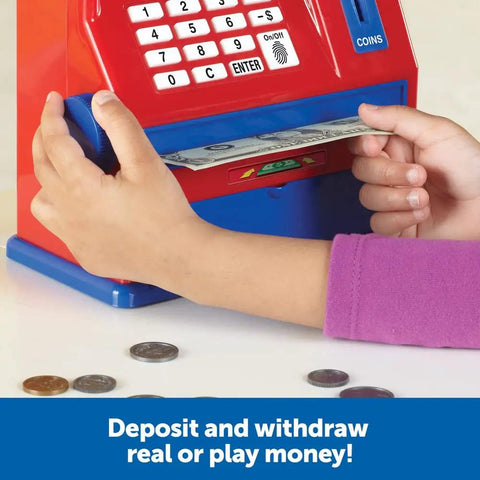 Child using Kid Friendly Interactive Pretend ATM Bank For Kids Electronic Piggy Bank With Deposits And Withdrawals Balance Tracking