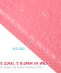 Close-up of the edge of Pink Bubble Mailers 60 Pack Self Seal Padded Shipping Bags 11x15cm, showing 0.8mm width.