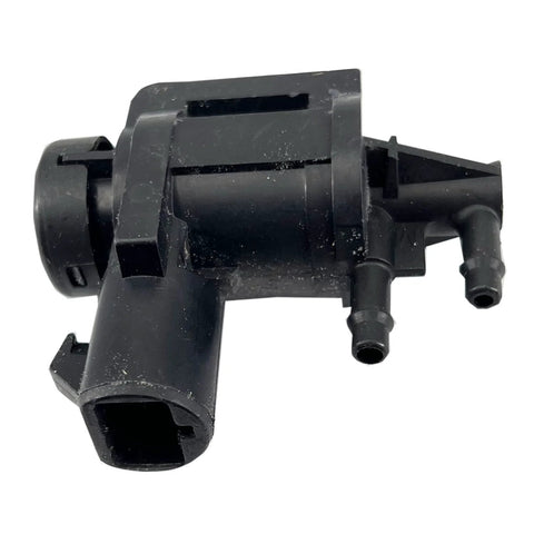 Side view of black plastic vacuum solenoid valve for automotive hub lock actuator; 13mm connector.