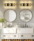 Modern Up And Down LED Vanity Light 36W With Built In LEDs In Black Gold Finish above mirror in bathroom, 3000K warm white.