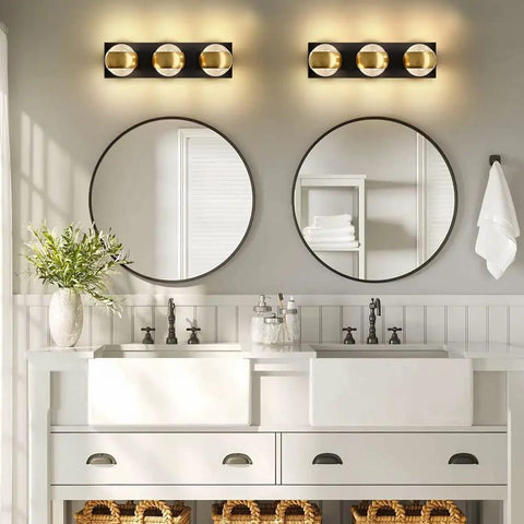 Modern Up And Down LED Vanity Light 36W With Built In LEDs In Black Gold Finish above mirror in bathroom, 3000K warm white.