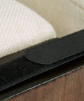Close-up of Heavy Duty Couch Connectors For Sliding Sectional Sofas 4 Pack's hook and loop strap on fabric surface.