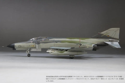 Side view of a 1/72 Luftwaffe F-4F Fighter JG71 Richthofen Hangar-Ready DIY Unpainted Plastic Model Kit FX06 plane on display.