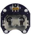 Close-up of Hella Reliable 10 Pack LilyPad CR2032 Coin Cell Battery Holder Module for Arduino wearables, showing tabs and switch.