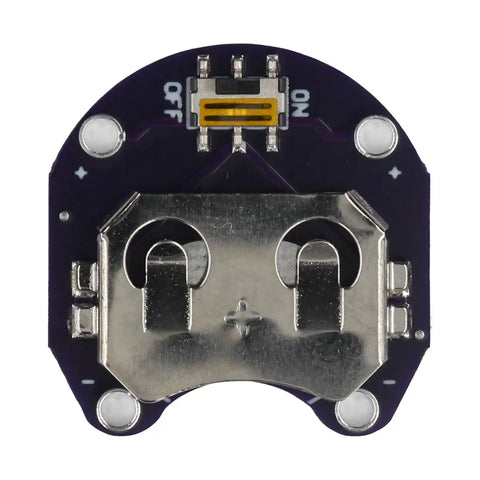Close-up of Hella Reliable 10 Pack LilyPad CR2032 Coin Cell Battery Holder Module for Arduino wearables, showing tabs and switch.