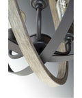 Close-up of Conestee Mini Pendant Light in Graphite Black with Weathered Gray Accents, armillary frame and bulb holder detail