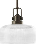 Archie Collection One Light Pendant in Venetian Bronze with Clear Prismatic Glass, 10.5 inch diameter by 9.25 inch height, close-up view.
